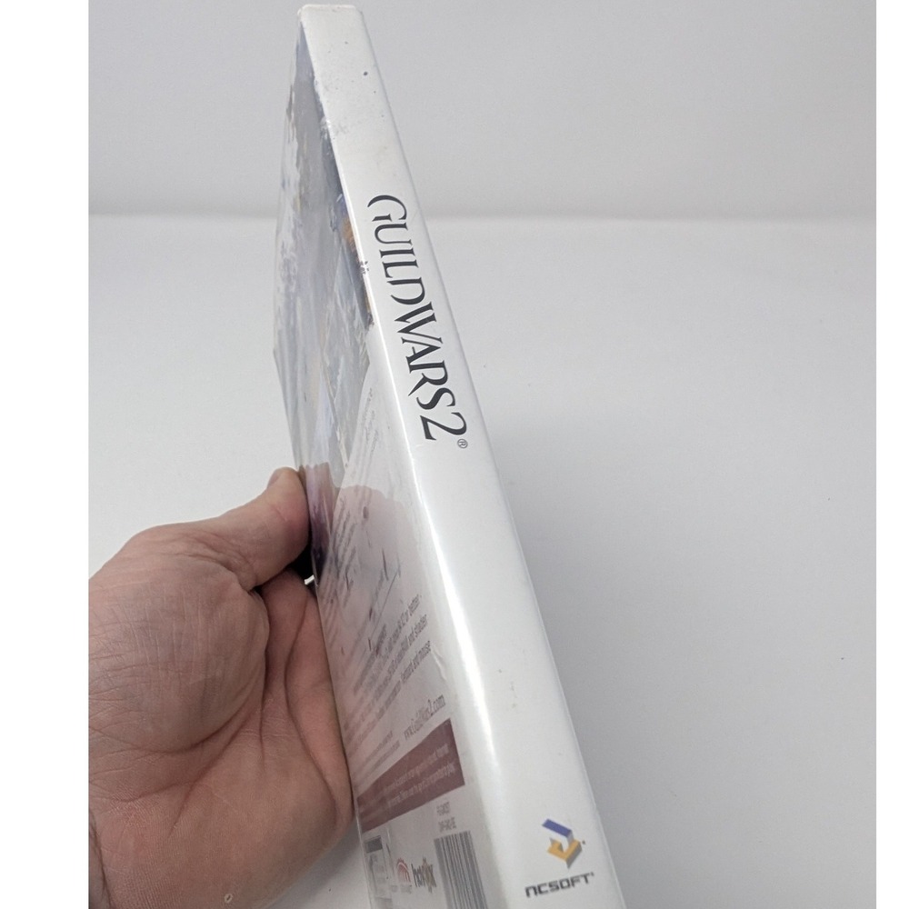 Guild Wars 2 PC Game DVD-ROM ArenaNet 2-Disc Set with Manual and Serial Code - Picture 6 of 11